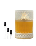 Zimaya Sharaf Divine sample – decant naast de volle fles ter herkenning